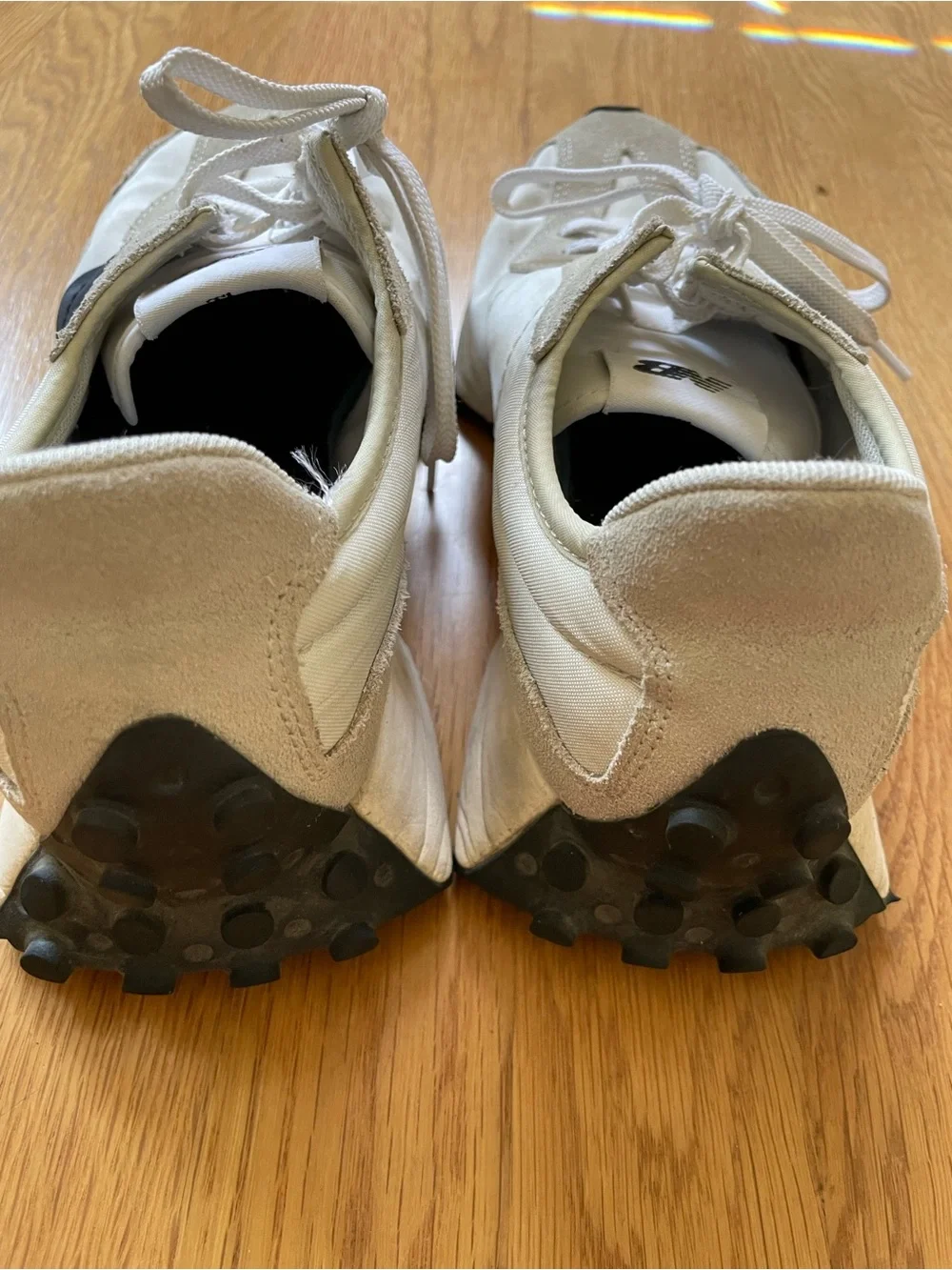 New Balance White and Black Low-Profile Sneakers